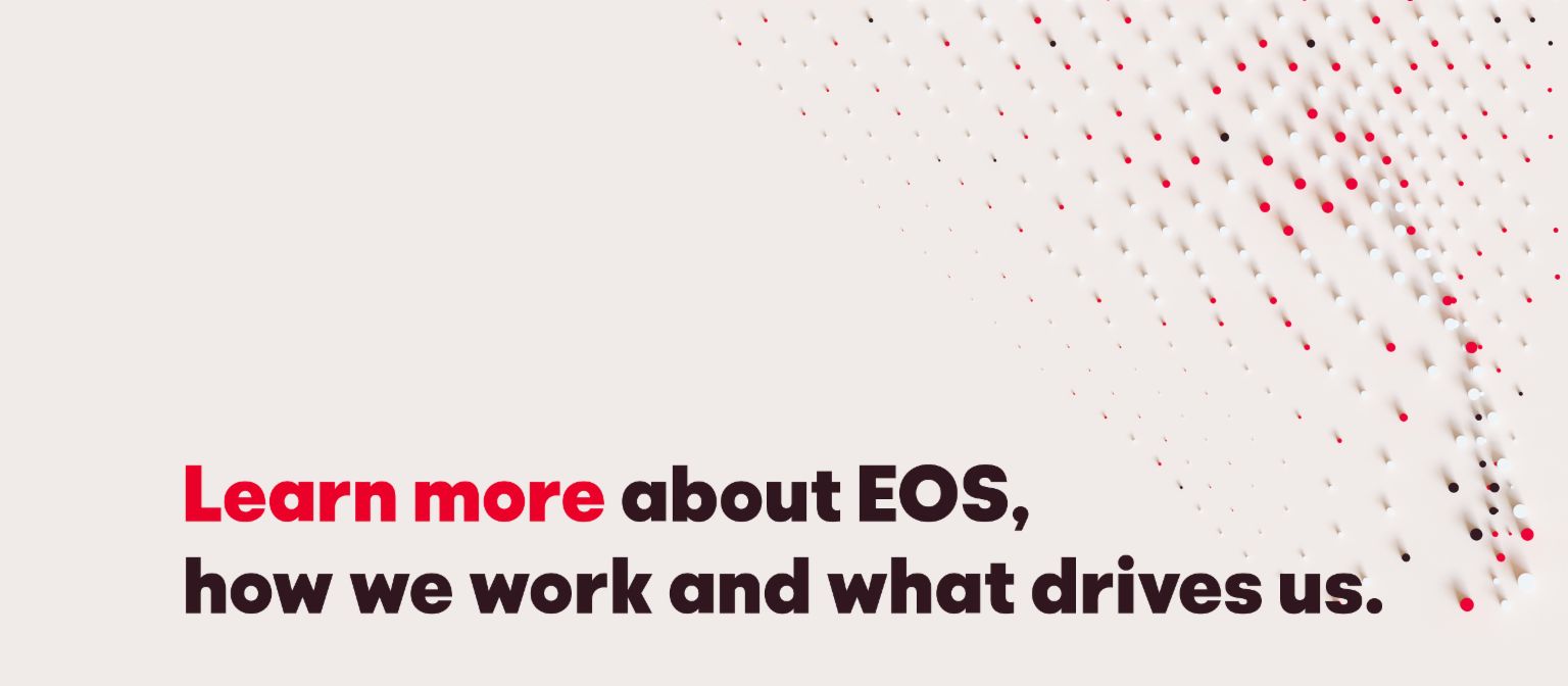 Триизмерно лого на EOS на размазан фон